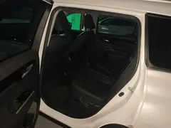 2022 Toyota Highlander Hybrid 2.5L 4WD Premium 7-seat, белый — фото 18