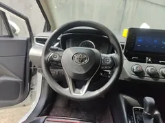 2021 Toyota Corolla TNGA 1.5L CVT Pioneer, белый — фото 11