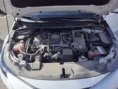 2022 Toyota Levin Hybrid 1.8H E-CVT Leading, белый — фото 21