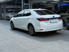 2020 Toyota Corolla Hybrid E+ 1.8L Hybrid E-CVT Comfort, белый — фото 3