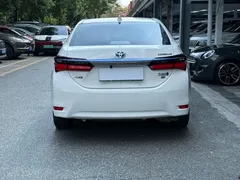 2020 Toyota Corolla Hybrid E+ 1.8L Hybrid E-CVT Comfort, белый — фото 5
