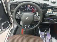 2021 Mitsubishi Outlander 2.4L 4WD 7-seat, белый — фото 11