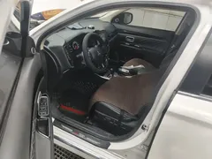 2021 Mitsubishi Outlander 2.4L 4WD 7-seat, белый — фото 17