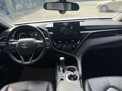 2023 Toyota Camry 2.0G Luxury, белый — фото 9
