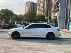 2022 BMW 3 Series 325Li M Sport Night Package, белый — фото 4