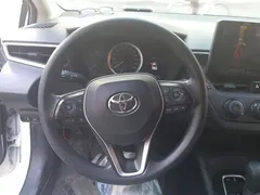 2021 Toyota Corolla TNGA 1.5L CVT Pioneer, белый — фото 15
