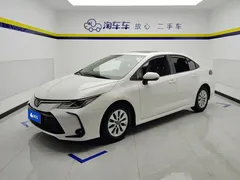 2021 Toyota Corolla TNGA 1.5L CVT Elite, белый — фото 1