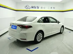 2021 Toyota Corolla TNGA 1.5L CVT Elite, белый — фото 3