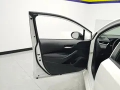 2021 Toyota Corolla TNGA 1.5L CVT Elite, белый — фото 7