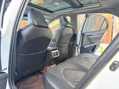 2023 Toyota Camry Hybrid 2.5HG Luxury, белый — фото 7