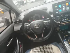 2021 Toyota Levin 1.8H Hybrid E-CVT Luxury, белый — фото 15