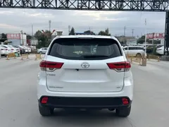 2018 Toyota Highlander 2.0T 4WD Elite 7-seat China VI, белый — фото 9