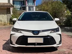 2021 Toyota Corolla Hybrid 1.8L E-CVT Elite, белый — фото 2