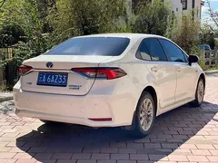 2021 Toyota Corolla Hybrid 1.8L E-CVT Elite, белый — фото 5