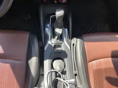 2021 Toyota Corolla Hybrid 1.8L E-CVT Elite, белый — фото 12