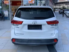 2021 Toyota Highlander 2.0T 4WD Elite 7-seat, белый — фото 7