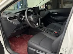 2023 Toyota Corolla 1.2T Elite, белый — фото 7