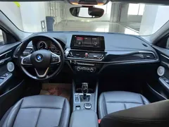 2022 BMW 1 Series 120i M Sport, синий — фото 18
