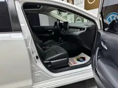2021 Toyota Corolla 1.2T S-CVT Elite Plus, белый — фото 10