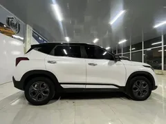 2023 Kia Seltos 1.5L CVT Luxury, белый — фото 8