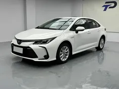 2021 Toyota Corolla Hybrid 1.8L E-CVT Elite, белый — фото 1