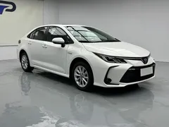 2021 Toyota Corolla Hybrid 1.8L E-CVT Elite, белый — фото 3
