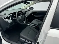 2021 Toyota Corolla Hybrid 1.8L E-CVT Elite, белый — фото 4