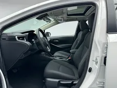 2021 Toyota Corolla Hybrid 1.8L E-CVT Elite, белый — фото 5