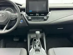 2021 Toyota Corolla Hybrid 1.8L E-CVT Elite, белый — фото 8
