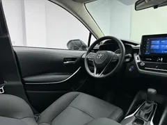 2021 Toyota Corolla Hybrid 1.8L E-CVT Elite, белый — фото 10