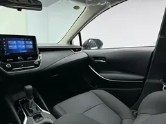 2021 Toyota Corolla Hybrid 1.8L E-CVT Elite, белый — фото 11