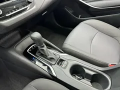 2021 Toyota Corolla Hybrid 1.8L E-CVT Elite, белый — фото 13