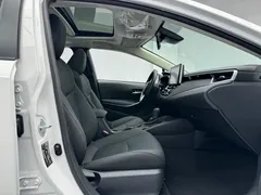2021 Toyota Corolla Hybrid 1.8L E-CVT Elite, белый — фото 14