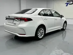 2021 Toyota Corolla Hybrid 1.8L E-CVT Elite, белый — фото 18