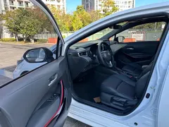 2022 Toyota Levin 1.8H Hybrid E-CVT Sport, белый — фото 17