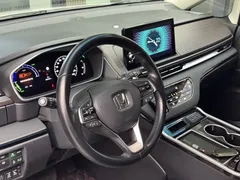 2022 Honda Odyssey 2.0L e:HEV, белый — фото 17