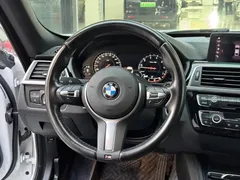 2020 BMW 3 Series GT 320i M Sport Package, белый — фото 14