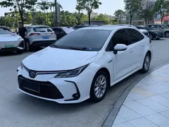 2021 Toyota Corolla Hybrid 1.8L E-CVT Elite, белый — фото 1