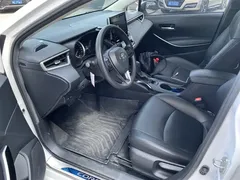 2021 Toyota Corolla Hybrid 1.8L E-CVT Elite, белый — фото 4