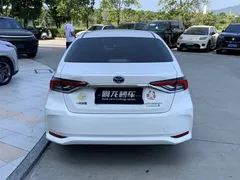 2021 Toyota Corolla Hybrid 1.8L E-CVT Elite, белый — фото 7