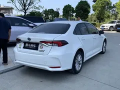 2021 Toyota Corolla Hybrid 1.8L E-CVT Elite, белый — фото 8