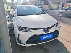 2021 Toyota Corolla Hybrid 1.8L E-CVT Elite, белый — фото 2
