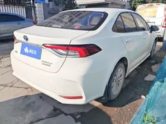 2021 Toyota Corolla Hybrid 1.8L E-CVT Elite, белый — фото 3