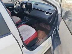 2021 Toyota Corolla Hybrid 1.8L E-CVT Elite, белый — фото 8