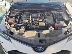 2021 Toyota Corolla Hybrid 1.8L E-CVT Elite, белый — фото 10
