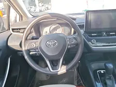 2021 Toyota Corolla Hybrid 1.8L E-CVT Elite, белый — фото 15