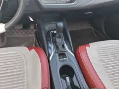 2021 Toyota Corolla Hybrid 1.8L E-CVT Elite, белый — фото 16