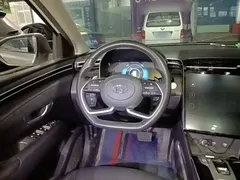 2021 Hyundai Tucson L 1.5T DCT GLX Elite, белый — фото 11