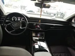 2023 Audi A8L 50 TFSI quattro Select, чёрный — фото 5