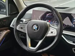 2023 BMW X7 xDrive40i Luxury Package, чёрный — фото 11